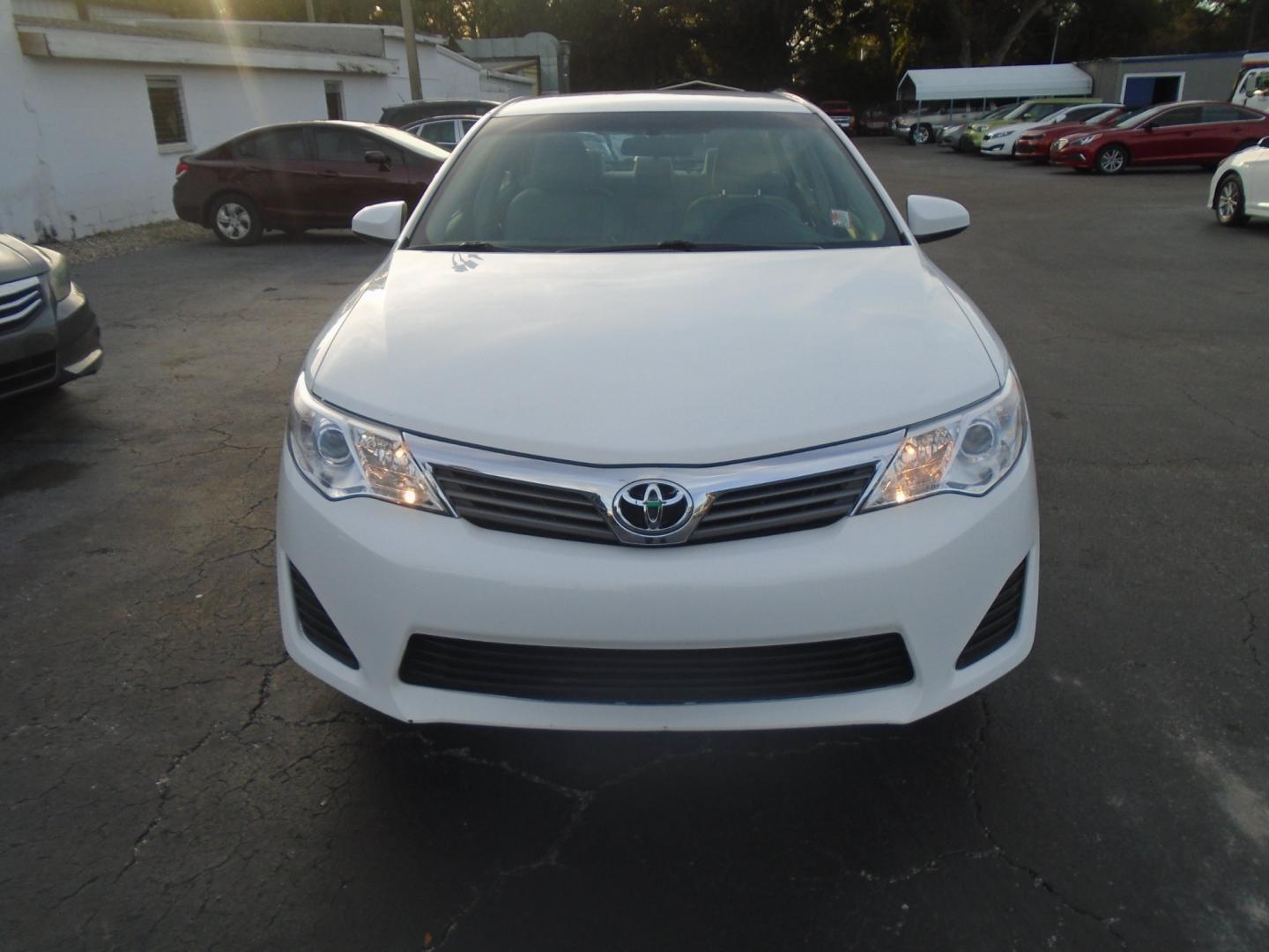 2014 Toyota Camry (4T1BF1FK0EU) , located at 6112 N Florida Avenue, Tampa, FL, 33604, (888) 521-5131, 27.954929, -82.459534 - Photo#1